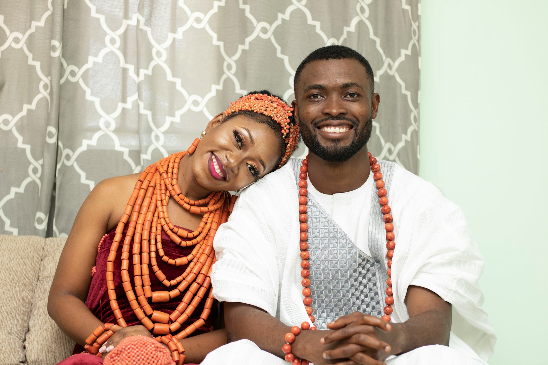 a man and woman sitting on a couch